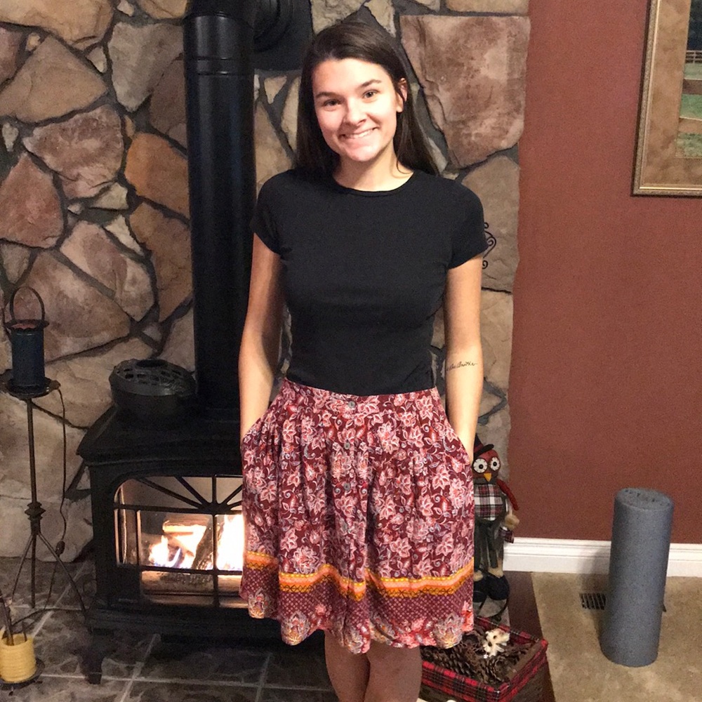 Multi color, multi patterned above the knee skirt.